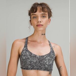 Lululemon Free To Be Wild Bra. Size 6. Black and Grey Pattern with Lime Straps.